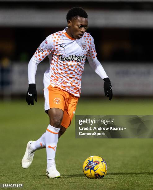 Blackpool's Karamoko Dembele breaks during the Sky Bet League One match between Cambridge United and Blackpool at Abbey Stadium on December 16, 2023...