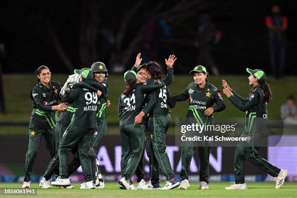 Pakistan celebrate their Super over win during game three of the Women's ODI series between New Zealand and Pakistan at Hagley Oval on December 18,...