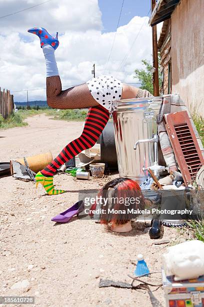 girl dumpster diving - garbage flecked stock pictures, royalty-free photos & images