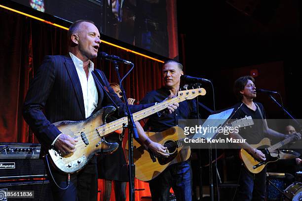 Sting and Bryan Adams perform on stage at the T.J. Martell Foundation's 38th Annual Honors Gala at Cipriani 42nd Street on October 22, 2013 in New...