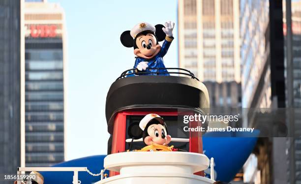 Mickey Mouse and Minnie Mouse impersonators attend the 97th Annual Macy's Thanksgiving Day Parade on November 23, 2023 in New York City.