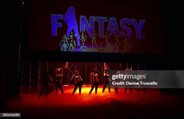 The cast of FANTASY performs during their calendar launch at the Luxor Hotel and Casino on October 22, 2013 in Las Vegas, Nevada.