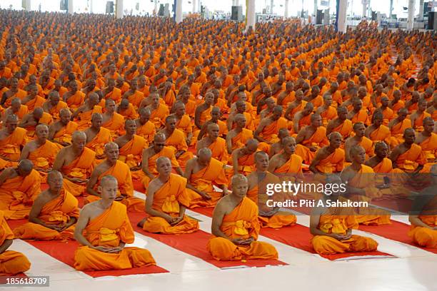 Novice monks from villages in Thailand and nationwide during a ceremony at The Great Sapha Dhammakaya Meditation Hall. More than ten thousand novice...