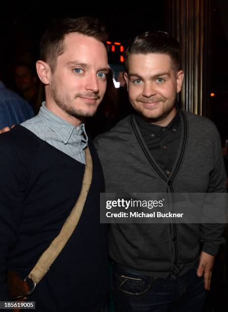 Host Elijah Wood and Fuse News correspondent Jack Osbourne attend the Assasin's Creed IV Black Flag Launch Party at Greystone Manor Supperclub on...