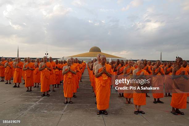 Novice monks from villages in Thailand and nationwide during a ceremony at Maha Dhammakaya Cetiya. More than ten thousand novice monks took part in...