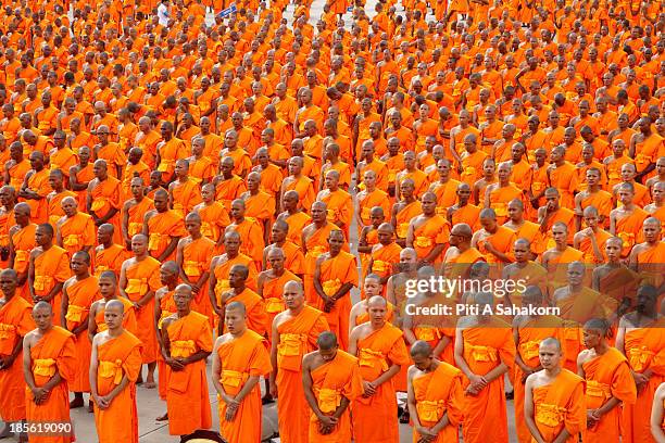 Novice monks from villages in Thailand and nationwide during a ceremony at Maha Dhammakaya Cetiya. More than ten thousand novice monks took part in...