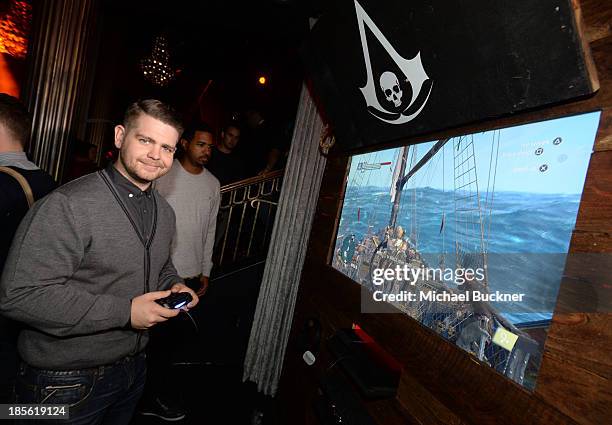 Fuse News correspondent Jack Osbourne playing the Sony Playstation 4 at the Assasin's Creed IV Black Flag Launch Party at Greystone Manor Supperclub...