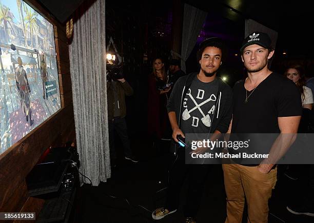 Connor Cruise and actor Alex Pettyfer attend the Assasin's Creed IV Black Flag Launch Party at Greystone Manor Supperclub on October 22, 2013 in West...