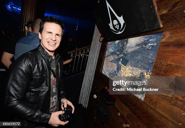 Actor/comedian Hal Sparks playing the Sony Playstation 4 at the Assasin's Creed IV Black Flag Launch Party at Greystone Manor Supperclub on October...