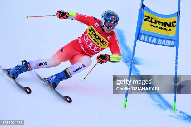 Switzerland's Marco Odermatt competes in the first run of the men's Giant Slalom, during the FIS Alpine Ski World Cup in Alta Badia on December 18,...