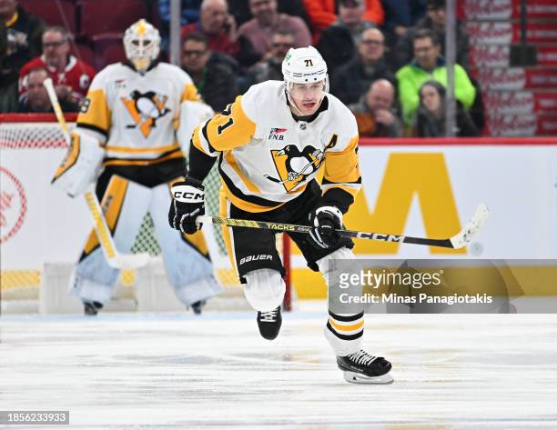Evgeni Malkin of the Pittsburgh Penguins skates during the third period against the Montreal Canadiens at the Bell Centre on December 13, 2023 in...