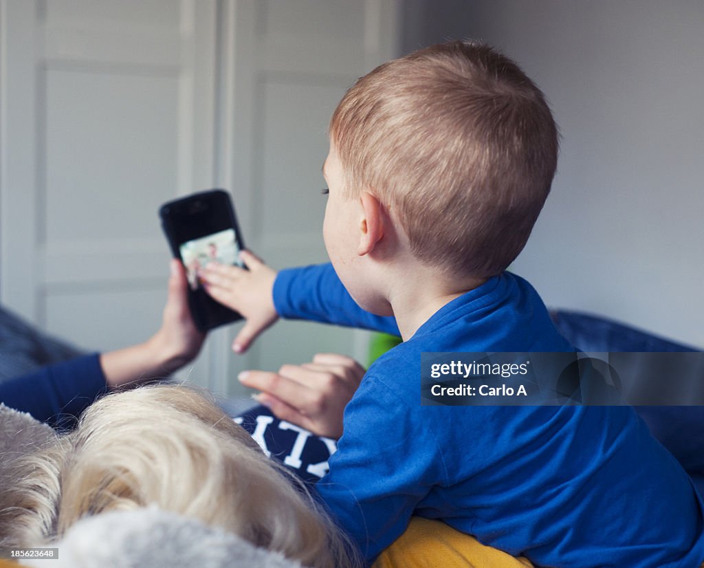 Mom and boy using smartphone