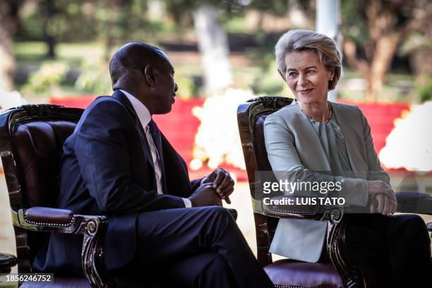 President of the European Commission Ursula von der Leyen and President of Kenya William Ruto talk while sitting ahead of the signature of a new...