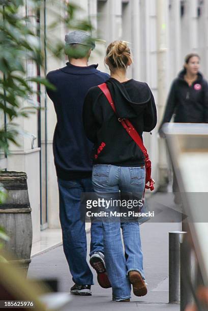 Actor Leonardo Di Caprio and girlfriend Bar Refaeli are seen strolling on 'Place du Marche Saint-Honore' on October 21, 2006 in Paris, France.