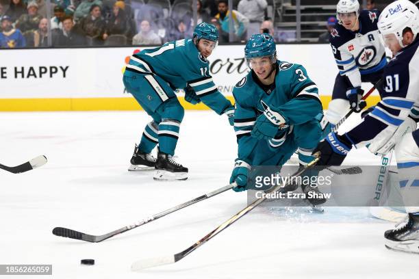 Henry Thrun of the San Jose Sharks in action against the Winnipeg Jets at SAP Center on December 12, 2023 in San Jose, California.