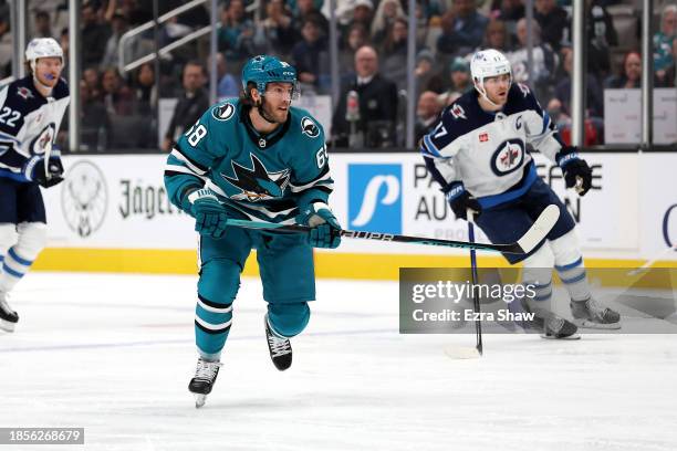 Mike Hoffman of the San Jose Sharks in action against the Winnipeg Jets at SAP Center on December 12, 2023 in San Jose, California.