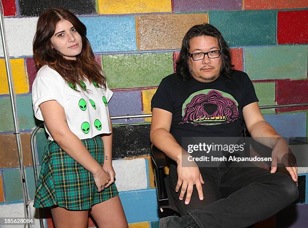 Bethany Cosentino and Bobb Bruno of Best Coast pose backstage at Amoeba Music on October 22, 2013 in Hollywood, California.