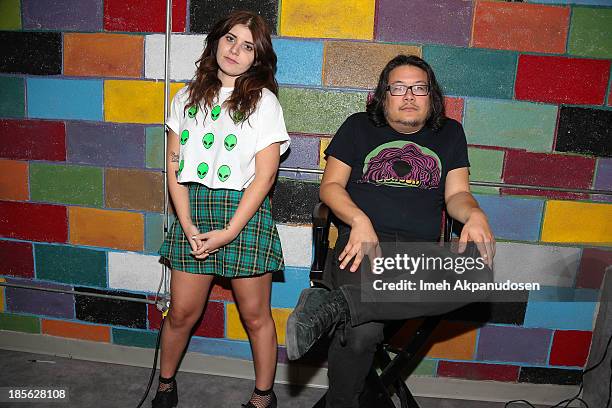 Bethany Cosentino and Bobb Bruno of Best Coast pose backstage at Amoeba Music on October 22, 2013 in Hollywood, California.