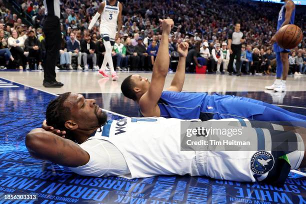 Naz Reid of the Minnesota Timberwolves reacts after being fouled by Dante Exum of the Dallas Mavericks in the first half at American Airlines Center...