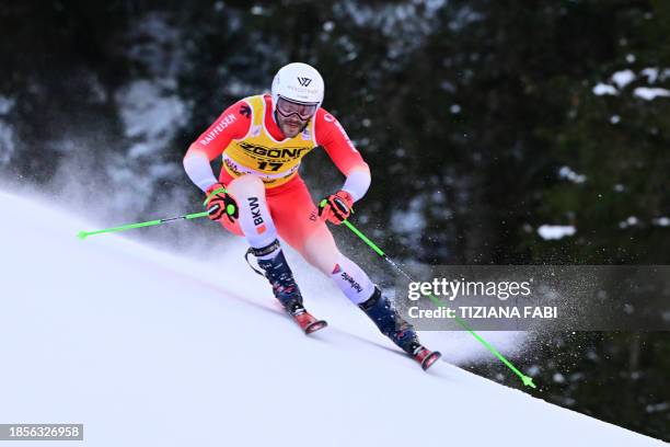 Switzerland's Thomas Tumler competes in the first run of the men's Giant Slalom, during the FIS Alpine Ski World Cup in Alta Badia on December 18,...