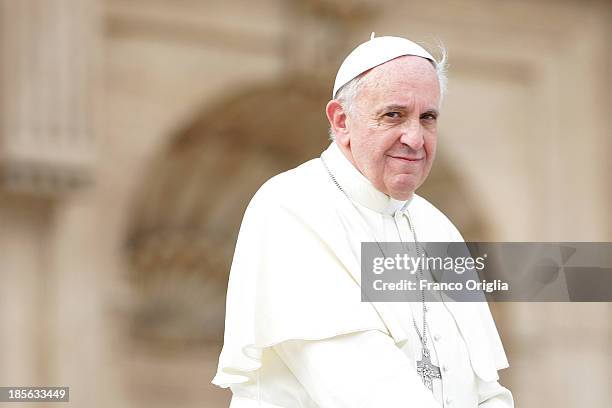 Pope Francis attends his weekly audience in St. Peter's Square on October 23, 2013 in Vatican City, Vatican. The Pontiff greeted thousands of...