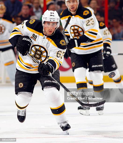 Brad Marchand of the Boston Bruins skates with the puck against the Florida Panthers at the BB&T Center on October 17, 2013 in Sunrise, Florida.