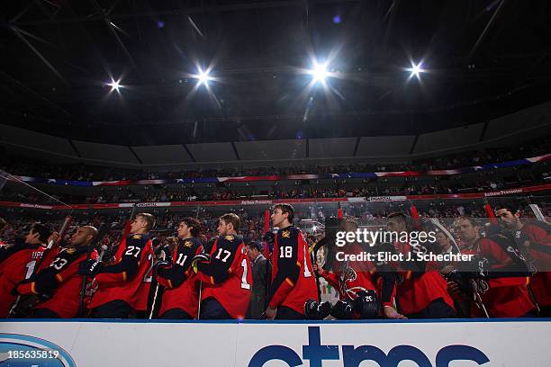 The Florida Panthers line up for the national anthem prior to the start of the game against the Boston Bruins at the BB&T Center on October 17, 2013...