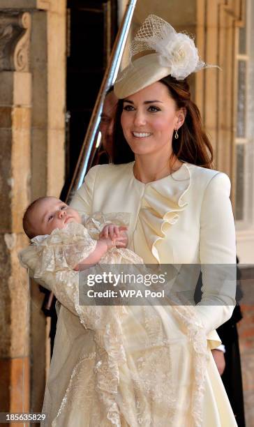 Catherine, Duchess of Cambridge carries her son Prince George Of Cambridge after his christening at the Chapel Royal in St James's Palace on October...