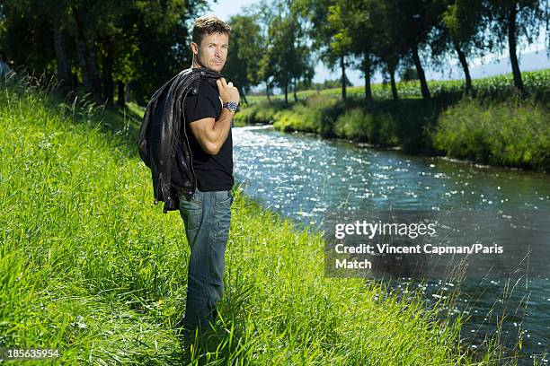 Skydiver, daredevil and base jumper Felix Baumgartner is photographed for Paris Match on September 3, 2013 in Widnau, Switzerland.