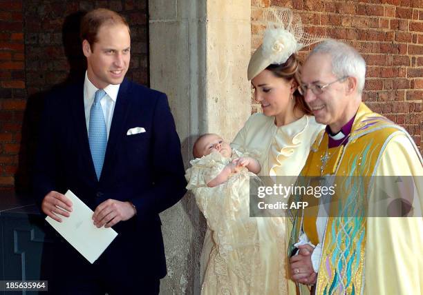 Britain's Prince William, Duke of Cambridge, and his wife Catherine, Duchess of Cambridge, leave with their son Prince George of Cambridge following...