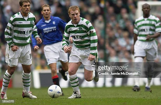 Neil Lennon of Celtic charges through on goal during the Scottish Premier League match between Glasgow Celtic and Glasgow Rangers held on March 8,...