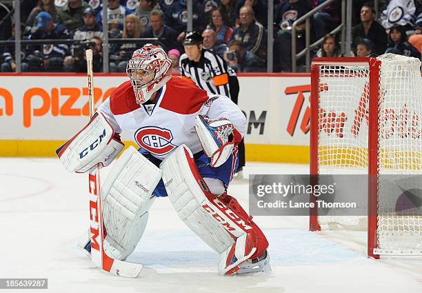 Goaltender Carey Price of the Montreal Canadiens gets set during first period action against the Winnipeg Jets at the MTS Centre on October 15, 2013...