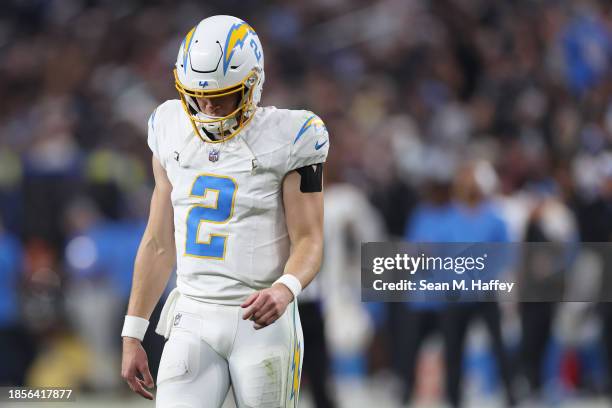 Quarterback Easton Stick of the Los Angeles Chargers reacts against the Las Vegas Raiders during the third quarter at Allegiant Stadium on December...
