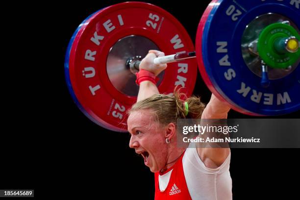 Tima Turieva from Russia lifts in Snatch competition woman's 63 kg Group A during weightlifting IWF World Championships Wroclaw 2013 at Centennial...