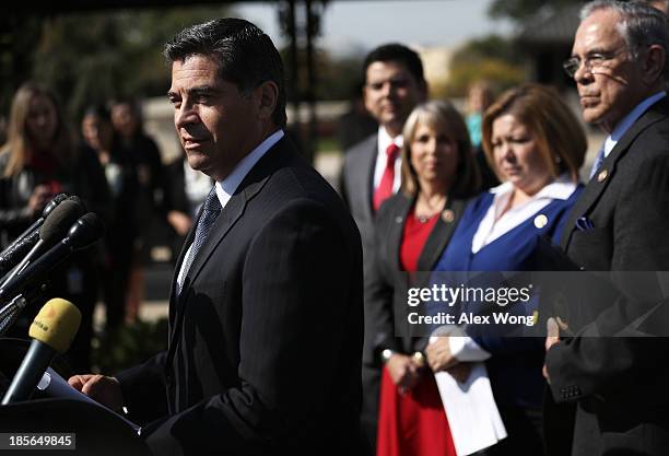 Rep. Xavier Becerra speaks as Congressional Caucus Chair Rep. Rubén Hinojosa looks on during a news conference with and Rep. Joaquin Castro October...
