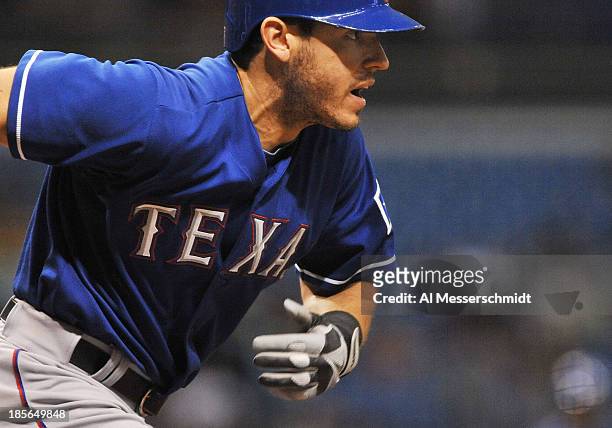 Infielder Ian Kinsler of the Texas Rangers runs to 1st base against the Tampa Bay Rays September 16, 2013 at Tropicana Field in St. Petersburg,...