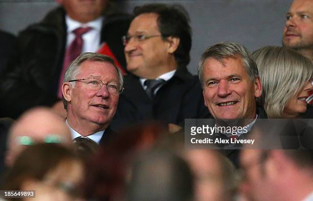 Former Manchester United Manager Sir Alex Ferguson chats to former United Chief Executive David Gill during the UEFA Champions League Group A match...