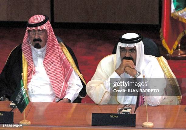 Saudi Arabian head of state Abdullah Ibn Abdul Aziz Al Saud and Qatari President Hamad Ibn Khalifa Al Thani of the Organization of Petroleum...