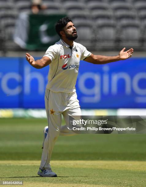 Aamer Jamal of Pakistan celebrates after dismissing Pat Cummins during day two of the Men's First Test match between Australia and Pakistan at Optus...