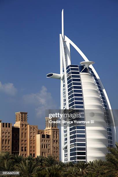 burj al arab hotel with madinat jumeirah in front - al qasr stock pictures, royalty-free photos & images