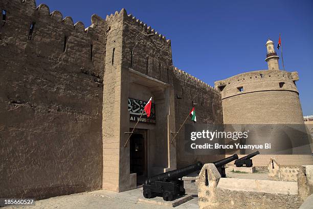 the entrance of al fahidi fort in bur dubai - bur al arab stock pictures, royalty-free photos & images