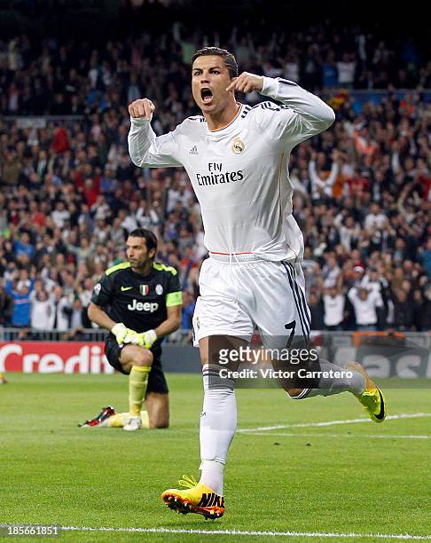 Cristiano Ronaldo of Real Madrid celebrates after scoring the opening goal during the UEFA Champions League Group B match between Real Madrid and...