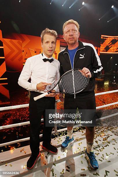 Oliver Pocher and Boris Becker attend the TV Show 'Alle auf den Kleinen' with Boris Becker and Lilly Becker vs Oliver Pocher on October 22, 2013 in...