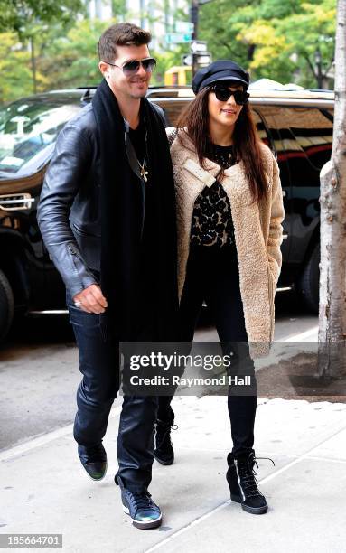 Ringer Robin Thicke and wife Paula Patton are seen in Soho on October 23, 2013 in New York City.