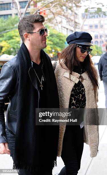 Ringer Robin Thicke and wife Paula Patton are seen in Soho on October 23, 2013 in New York City.