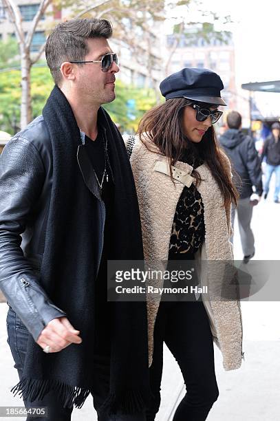 Ringer Robin Thicke and wife Paula Patton are seen in Soho on October 23, 2013 in New York City.