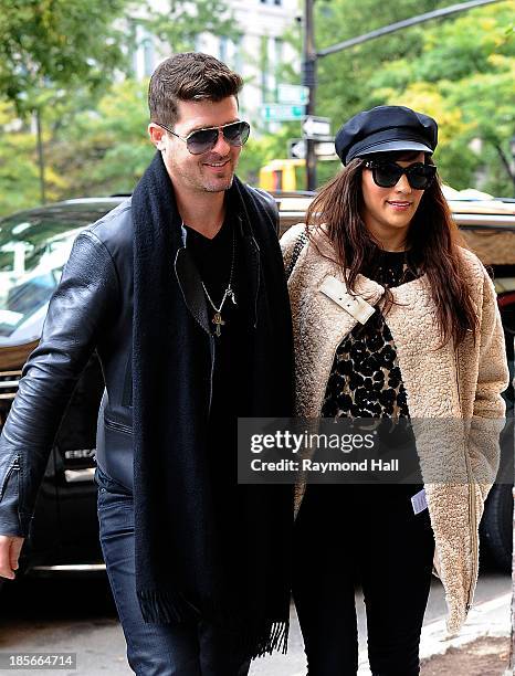 Ringer Robin Thicke and wife Paula Patton are seen in Soho on October 23, 2013 in New York City.