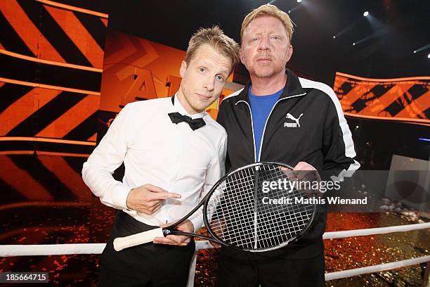 Oliver Pocher and Boris Becker attend the TV Show 'Alle auf den Kleinen' with Boris Becker and Lilly Becker vs Oliver Pocher on October 22, 2013 in...