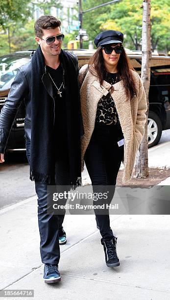 Ringer Robin Thicke and wife Paula Patton are seen in Soho on October 23, 2013 in New York City.