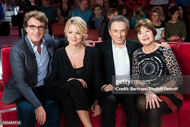 Actor and guest of honor Francois Cluzet, actress Virginie Efira, show host Michel Drucker and actress Macha Meril pose during an interruption of the...